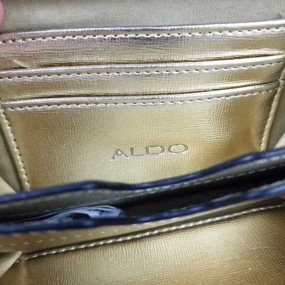 ALDO | metallic gold zip close wrist strap wallet - Picture 6 of 6